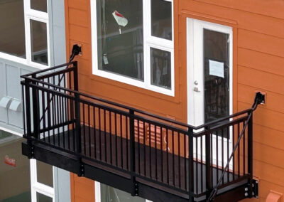 Rogue Triton Railing on Apartment Building Balcony